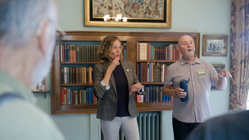 A volunteer guide and a BSL interpreter give a tour of Chartwell, Kent.